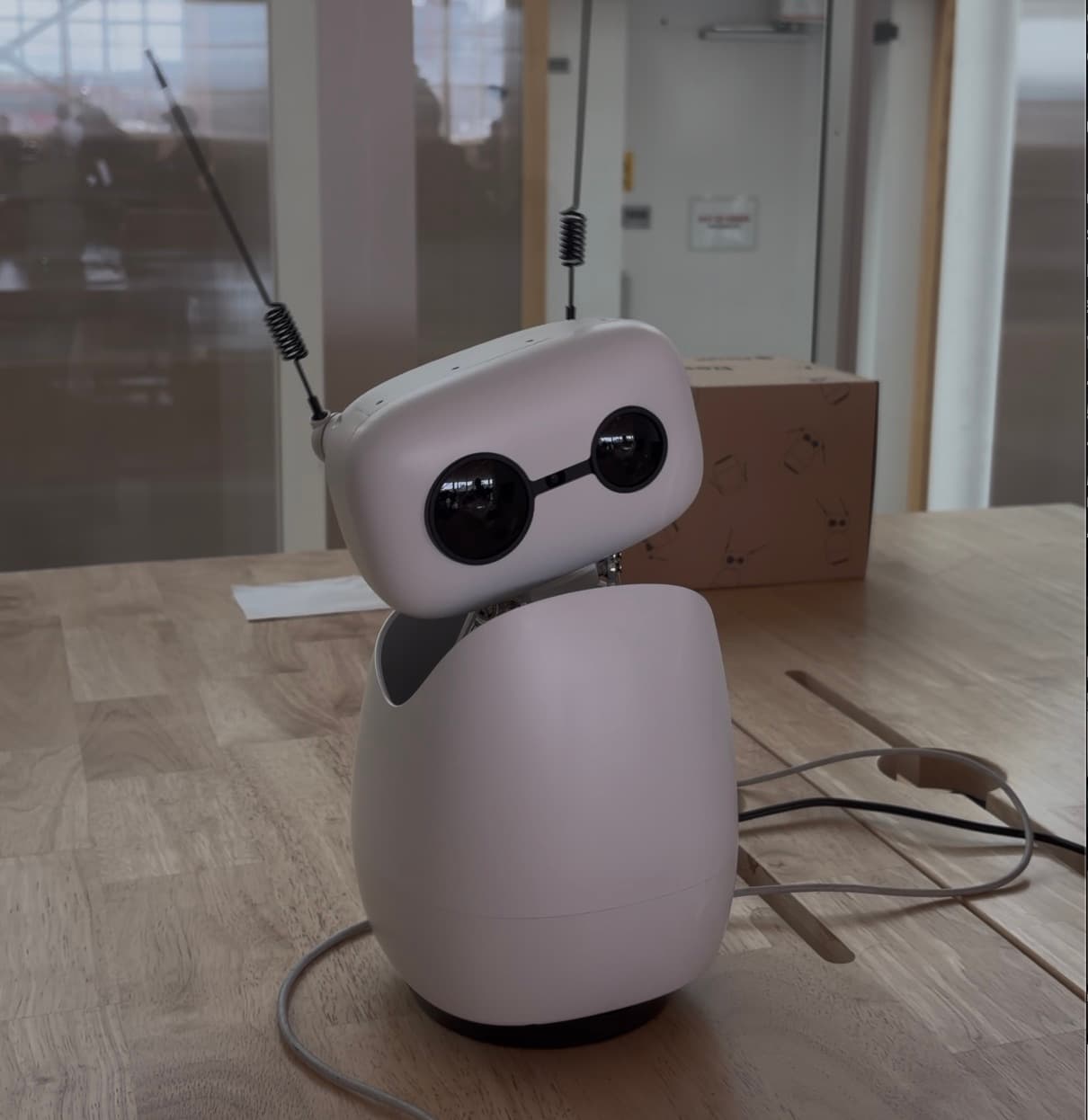 Reachy Mini, an open-source desktop robot from Hugging Face, on a desk at MagasinX in Stockholm